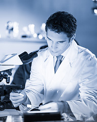 Image showing Life science researcher working in scientific laboratory.