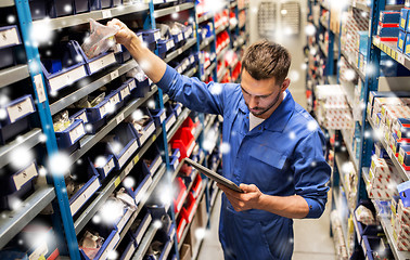 Image showing auto mechanic or smith with tablet pc at workshop