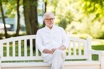 Image showing sad senior man at summer park