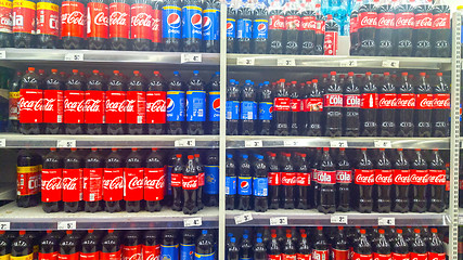 Image showing Coca-Cola and Pepsi bottles for sale