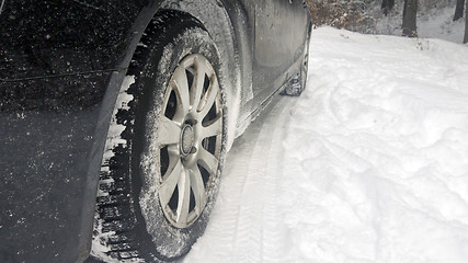 Image showing Car tires on winter road