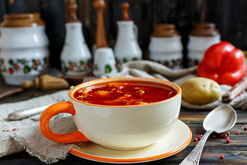 Image showing Thick soup goulash in a ceramic bowl.