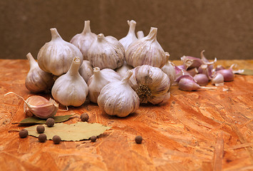 Image showing garlic on wooden surface