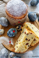 Image showing Easter cake and eggs on a wooden stand.