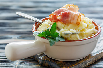 Image showing Fork in bowl with mashed potatoes and bacon.