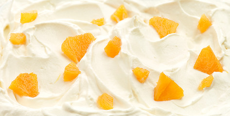 Image showing whipped cream with orange pieces