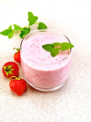 Image showing Milkshake strawberry on granite table