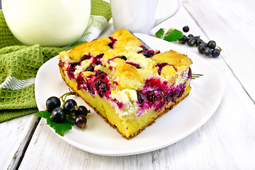 Image showing Pie with black currant in plate on light board