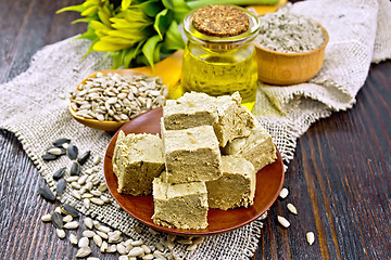 Image showing Halva in plate with seeds on board