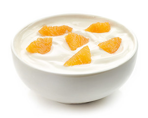 Image showing bowl of yogurt with orange pieces