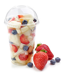 Image showing fresh fruit pieces salad in plastic cup