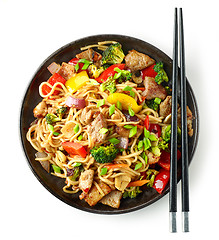 Image showing Plate of noodles with meat and vegetables