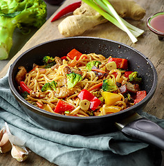 Image showing Asian egg noodles with vegetables and meat