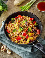 Image showing Asian egg noodles with vegetables and meat