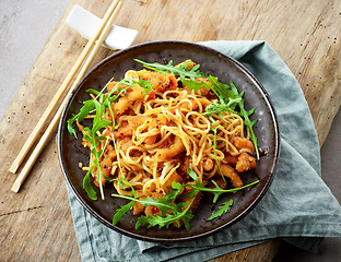 Image showing Plate of asian noodles with fried meat