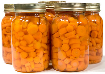 Image showing Five Mason Jars With Carrots