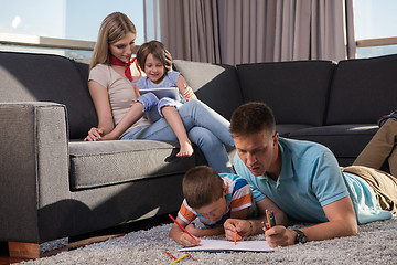 Image showing young couple spending time with kids