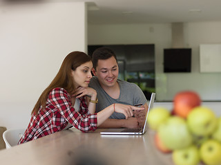 Image showing happy young couple buying online