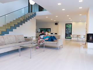 Image showing young happy couple relaxes in the living room