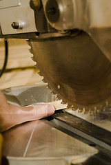 Image showing Power Saw Cutting Off A Thumb