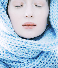 Image showing beauty young blond woman in scarf with weathered lips close up isolated