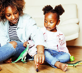 Image showing adorable sweet young afro-american mother with cute little daugh