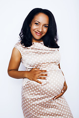 Image showing young pretty african american woman pregnant happy smiling, posing on white background isolated , lifestyle people concept