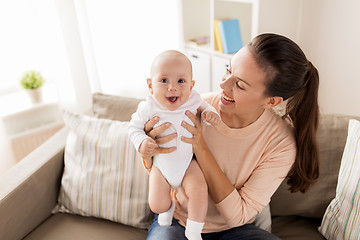 Image showing happy mother with little baby boy at home