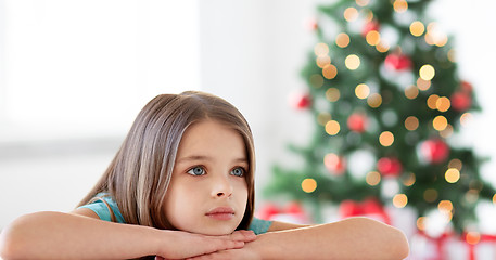 Image showing beautiful sad or bored girl at christmas