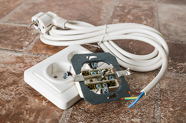 Image showing Electric socket and cable, close-up