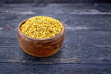 Image showing Fenugreek in clay bowl on board