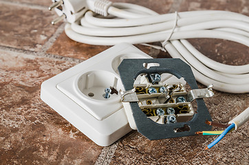 Image showing Electric socket and cable, close-up