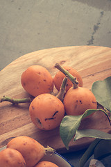 Image showing loquats on kitchen counter