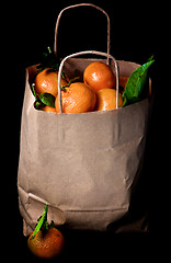 Image showing Ripe Tangerines with Leafs