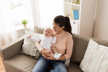 Image showing happy mother with little baby boy at home