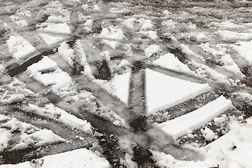 Image showing traces of the car on snow