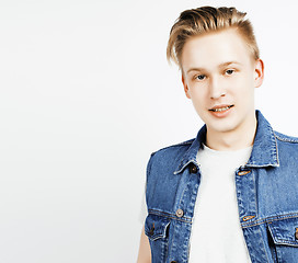 Image showing young handsome teenage hipster guy posing emotional, happy smiling against white background isolated, lifestyle people concept 