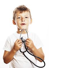 Image showing little cute boy with stethoscope playing like adult profession d