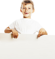 Image showing little cute boy holding empty shit to copyspace isolated close u