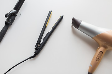 Image showing hairdryer, hot styler and curling iron or tongs