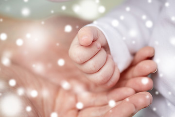 Image showing close up of mother and newborn baby hands