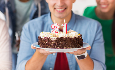 Image showing man with cake and friends at birthday party