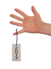 Image showing Hand holding a tag - New year - 2017