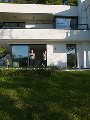 Image showing couple enjoying on the door of their luxury home villa