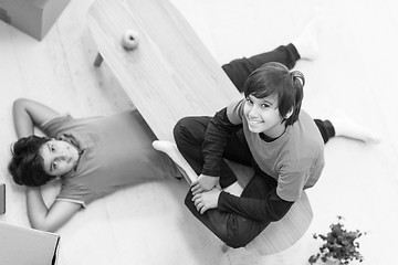 Image showing boys with cardboard boxes around them top view