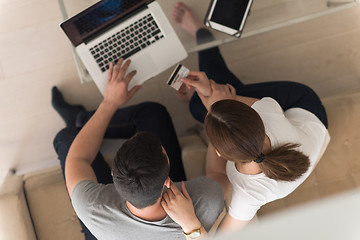 Image showing happy young couple buying online