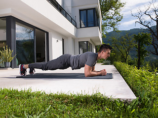 Image showing man doing morning yoga exercises