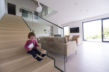 Image showing little cute girl enjoying on the stairs