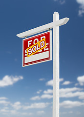 Image showing Left Facing Sold For Sale Real Estate Sign on a Blue Sky with Cl