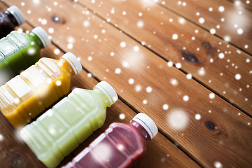 Image showing bottles with different fruit or vegetable juices